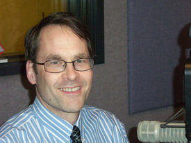 Dr.-Raymond-Rion-in-the-WLBY-Studio